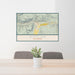 24x36 Gypsum Colorado Map Print Lanscape Orientation in Woodblock Style Behind 2 Chairs Table and Potted Plant