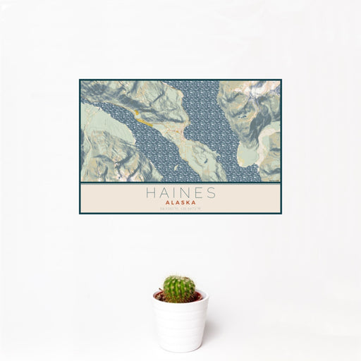 12x18 Haines Alaska Map Print Landscape Orientation in Woodblock Style With Small Cactus Plant in White Planter