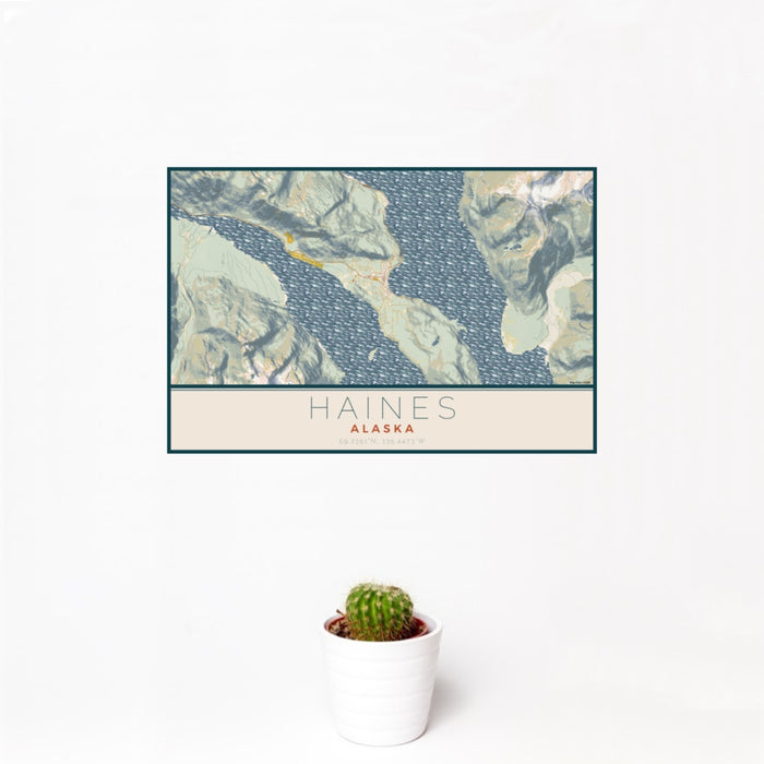 12x18 Haines Alaska Map Print Landscape Orientation in Woodblock Style With Small Cactus Plant in White Planter