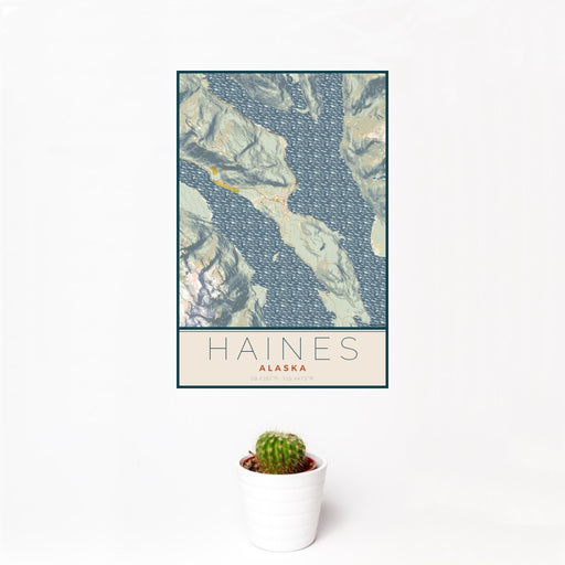 12x18 Haines Alaska Map Print Portrait Orientation in Woodblock Style With Small Cactus Plant in White Planter