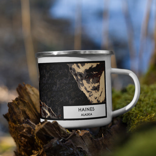 Right View Custom Haines Alaska Map Enamel Mug in Ember on Grass With Trees in Background
