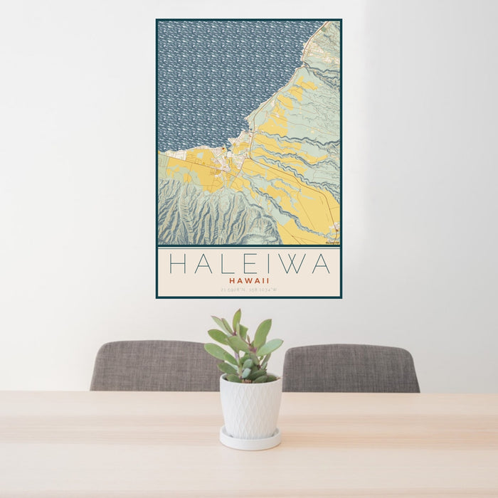24x36 Haleiwa Hawaii Map Print Portrait Orientation in Woodblock Style Behind 2 Chairs Table and Potted Plant