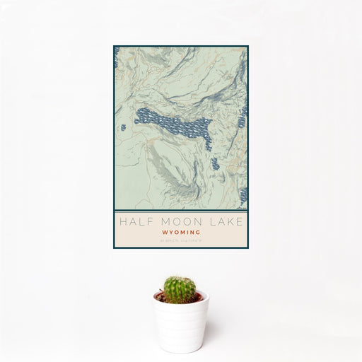 12x18 Half Moon Lake Wyoming Map Print Portrait Orientation in Woodblock Style With Small Cactus Plant in White Planter