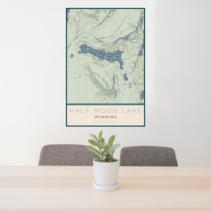 24x36 Half Moon Lake Wyoming Map Print Portrait Orientation in Woodblock Style Behind 2 Chairs Table and Potted Plant