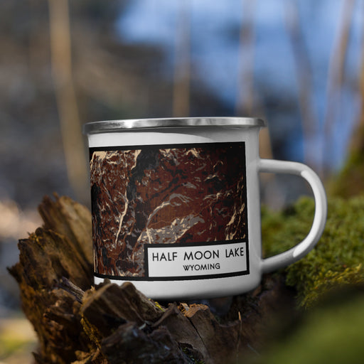 Right View Custom Half Moon Lake Wyoming Map Enamel Mug in Ember on Grass With Trees in Background
