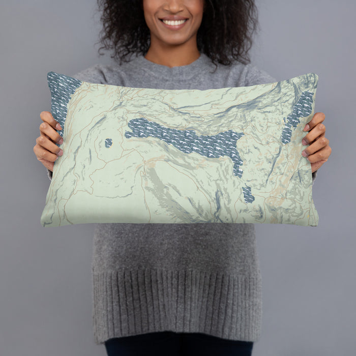 Person holding 20x12 Custom Half Moon Lake Wyoming Map Throw Pillow in Woodblock