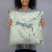 Person holding 18x18 Custom Half Moon Lake Wyoming Map Throw Pillow in Woodblock