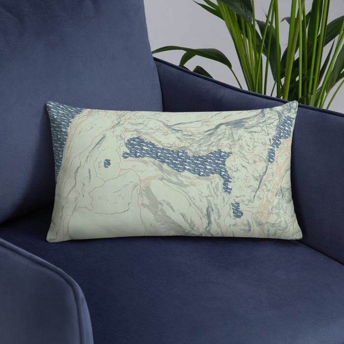 Custom Half Moon Lake Wyoming Map Throw Pillow in Woodblock on Blue Colored Chair