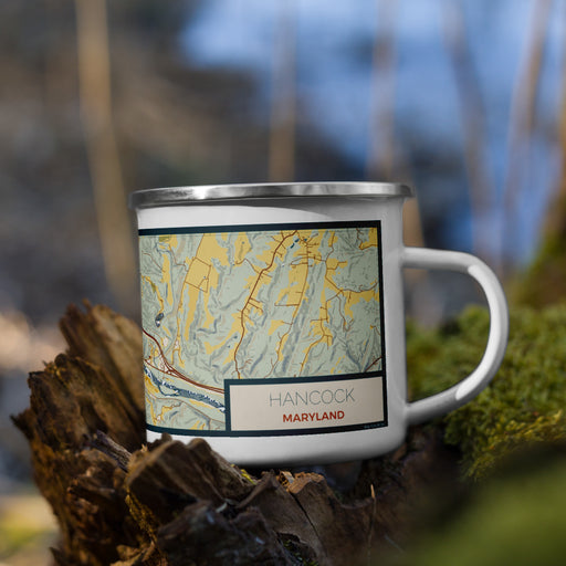 Right View Custom Hancock Maryland Map Enamel Mug in Woodblock on Grass With Trees in Background