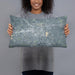 Person holding 20x12 Custom Hattiesburg Mississippi Map Throw Pillow in Afternoon