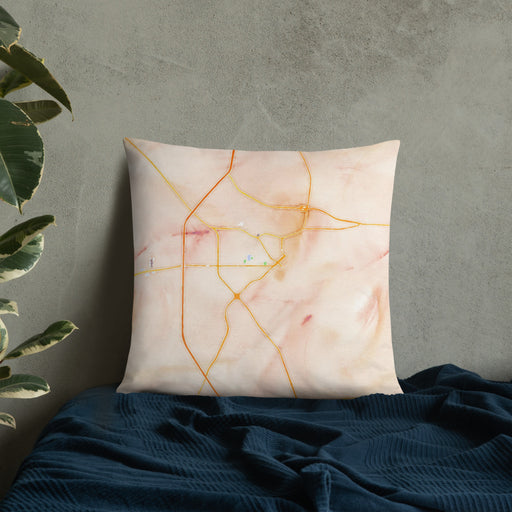 Custom Hattiesburg Mississippi Map Throw Pillow in Watercolor on Bedding Against Wall