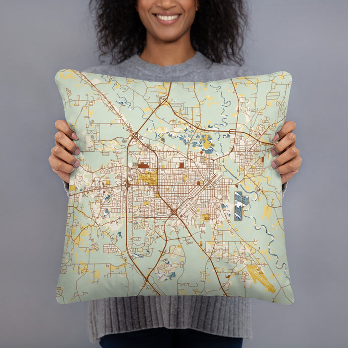Person holding 18x18 Custom Hattiesburg Mississippi Map Throw Pillow in Woodblock