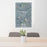 24x36 Havre Montana Map Print Portrait Orientation in Afternoon Style Behind 2 Chairs Table and Potted Plant