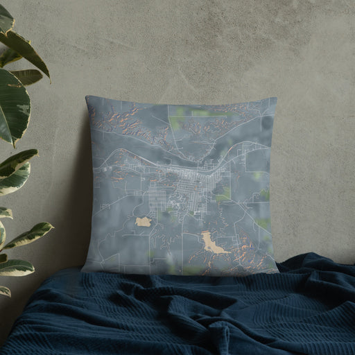 Custom Havre Montana Map Throw Pillow in Afternoon on Bedding Against Wall