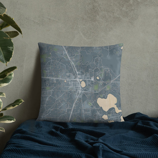 Custom Hawthorne Florida Map Throw Pillow in Afternoon on Bedding Against Wall