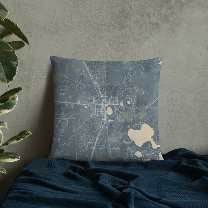 Custom Hawthorne Florida Map Throw Pillow in Afternoon on Bedding Against Wall
