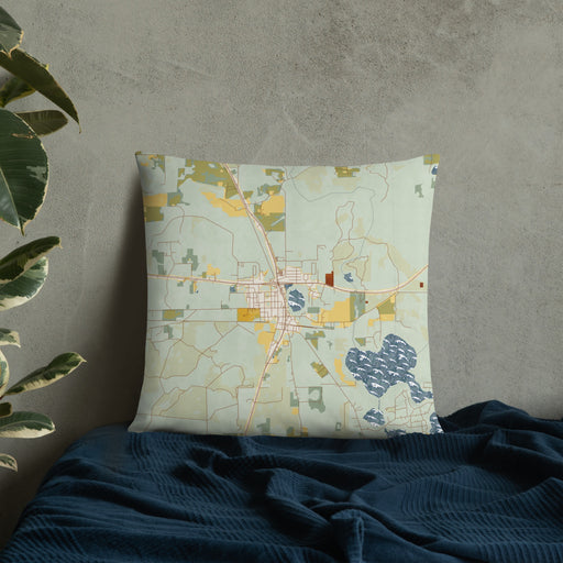 Custom Hawthorne Florida Map Throw Pillow in Woodblock on Bedding Against Wall