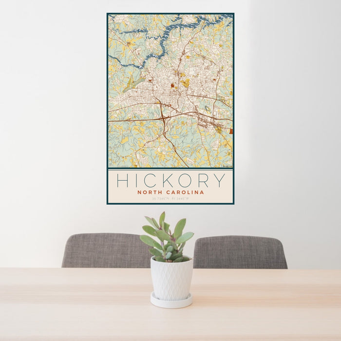 24x36 Hickory North Carolina Map Print Portrait Orientation in Woodblock Style Behind 2 Chairs Table and Potted Plant