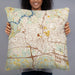 Person holding 22x22 Custom Hickory North Carolina Map Throw Pillow in Woodblock