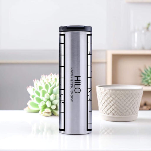 Hilo Hawaii Custom City Map Inscription Coordinates on 17oz Stainless Steel Insulated Tumbler in Tactile Lines with Succulent in Background