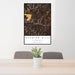 24x36 Hocking Hills Ohio Map Print Portrait Orientation in Ember Style Behind 2 Chairs Table and Potted Plant