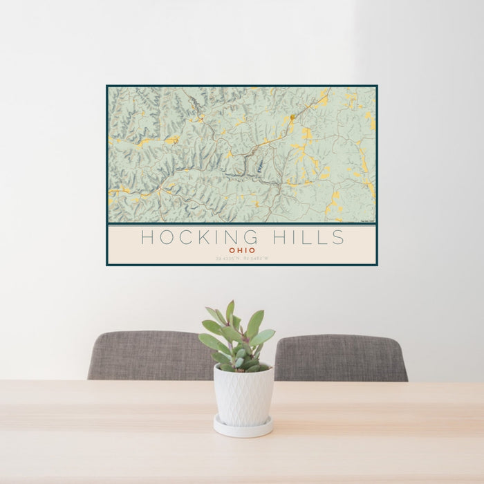 24x36 Hocking Hills Ohio Map Print Lanscape Orientation in Woodblock Style Behind 2 Chairs Table and Potted Plant