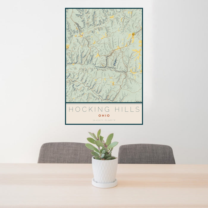 24x36 Hocking Hills Ohio Map Print Portrait Orientation in Woodblock Style Behind 2 Chairs Table and Potted Plant