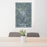 24x36 Huntsville Texas Map Print Portrait Orientation in Afternoon Style Behind 2 Chairs Table and Potted Plant