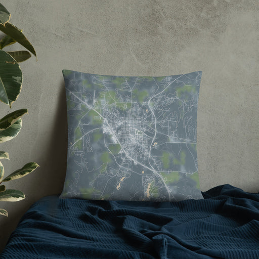 Custom Huntsville Texas Map Throw Pillow in Afternoon on Bedding Against Wall