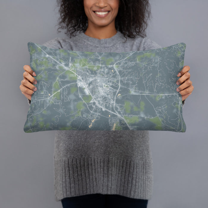 Person holding 20x12 Custom Huntsville Texas Map Throw Pillow in Afternoon