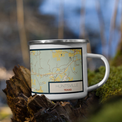 Right View Custom Huntsville Texas Map Enamel Mug in Woodblock on Grass With Trees in Background