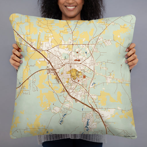 Person holding 22x22 Custom Huntsville Texas Map Throw Pillow in Woodblock