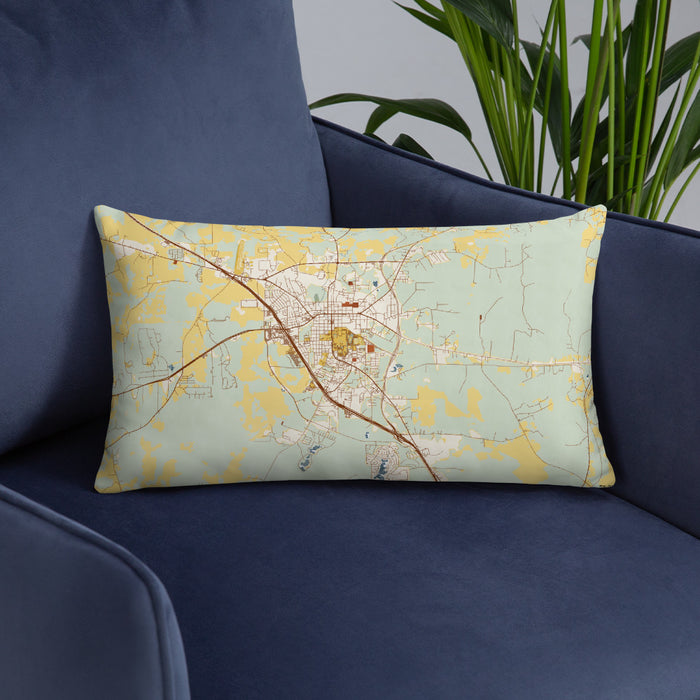 Custom Huntsville Texas Map Throw Pillow in Woodblock on Blue Colored Chair