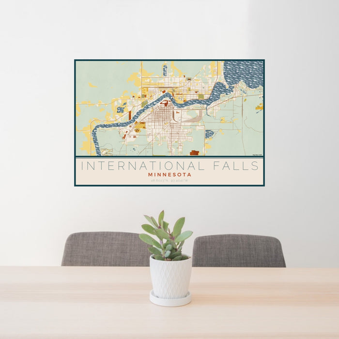 24x36 International Falls Minnesota Map Print Lanscape Orientation in Woodblock Style Behind 2 Chairs Table and Potted Plant