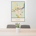 24x36 International Falls Minnesota Map Print Portrait Orientation in Woodblock Style Behind 2 Chairs Table and Potted Plant