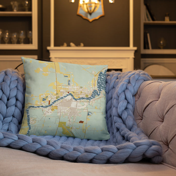 Custom International Falls Minnesota Map Throw Pillow in Woodblock on Cream Colored Couch