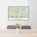 24x36 Itasca Minnesota Map Print Lanscape Orientation in Woodblock Style Behind 2 Chairs Table and Potted Plant