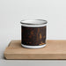 Front View Custom Itasca Minnesota Map Enamel Mug in Ember on Cutting Board