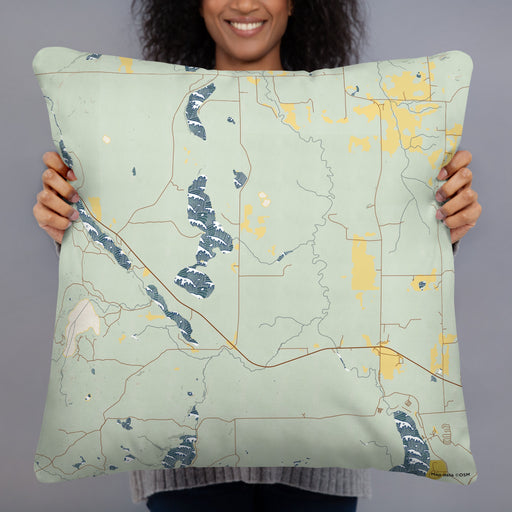 Person holding 22x22 Custom Itasca Minnesota Map Throw Pillow in Woodblock