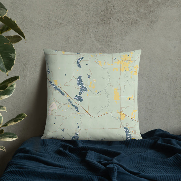 Custom Itasca Minnesota Map Throw Pillow in Woodblock on Bedding Against Wall