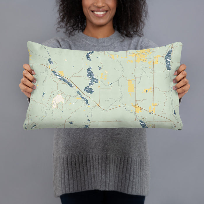 Person holding 20x12 Custom Itasca Minnesota Map Throw Pillow in Woodblock