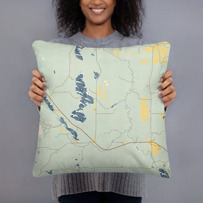 Person holding 18x18 Custom Itasca Minnesota Map Throw Pillow in Woodblock