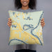 Person holding 18x18 Custom Jackson Lake Island Alabama Map Throw Pillow in Woodblock