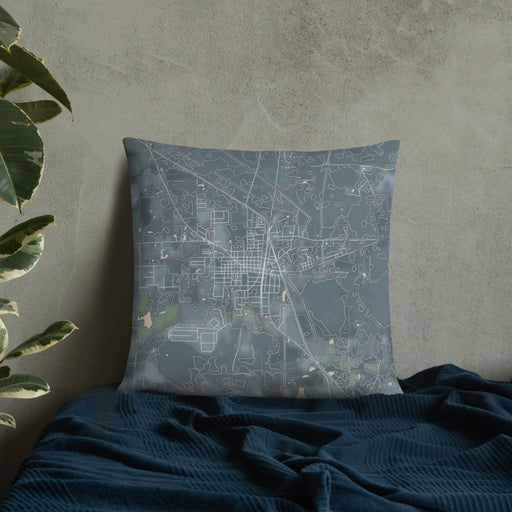 Custom Jasper Florida Map Throw Pillow in Afternoon on Bedding Against Wall
