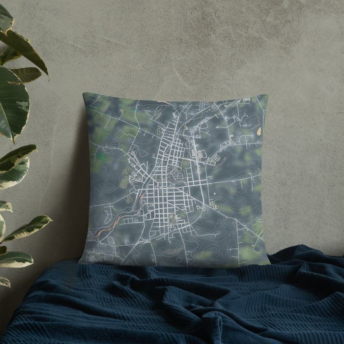 Custom Johnstown New York Map Throw Pillow in Afternoon on Bedding Against Wall