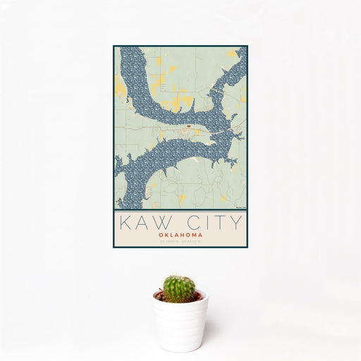 12x18 Kaw City Oklahoma Map Print Portrait Orientation in Woodblock Style With Small Cactus Plant in White Planter