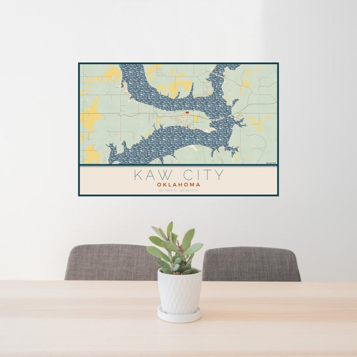 24x36 Kaw City Oklahoma Map Print Lanscape Orientation in Woodblock Style Behind 2 Chairs Table and Potted Plant