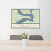 24x36 Kaw City Oklahoma Map Print Lanscape Orientation in Woodblock Style Behind 2 Chairs Table and Potted Plant