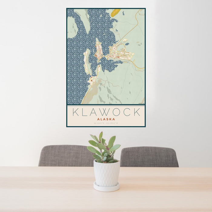 24x36 Klawock Alaska Map Print Portrait Orientation in Woodblock Style Behind 2 Chairs Table and Potted Plant
