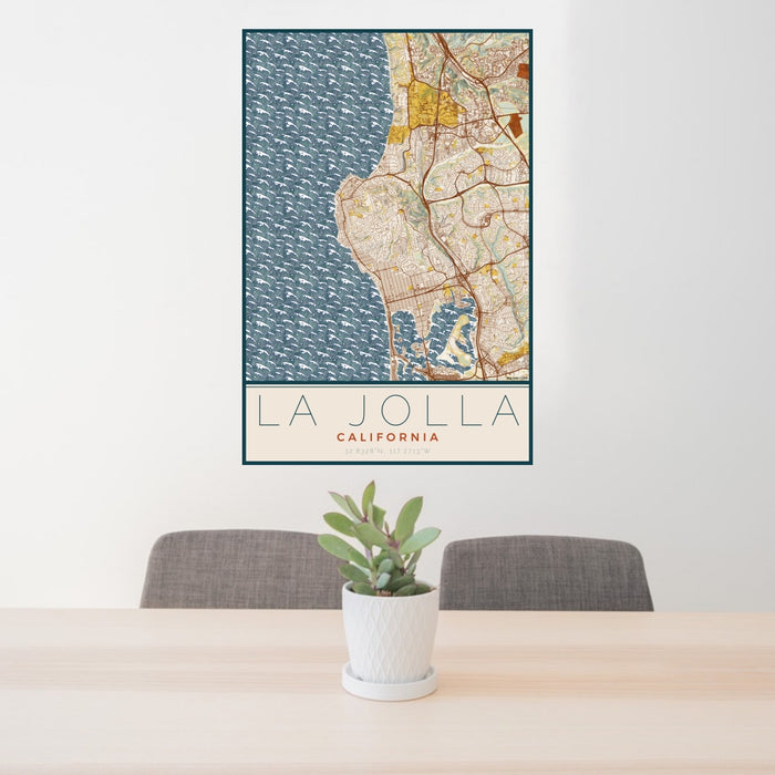 24x36 La Jolla California Map Print Portrait Orientation in Woodblock Style Behind 2 Chairs Table and Potted Plant